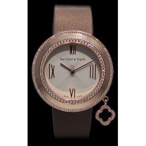 Montre Van Cleef & Arpels Charms en or et diamants