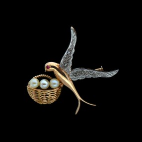 Broche ancienne hirondelle en or et perles