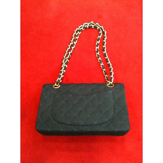 Sac Chanel 2.55 en tweed noir