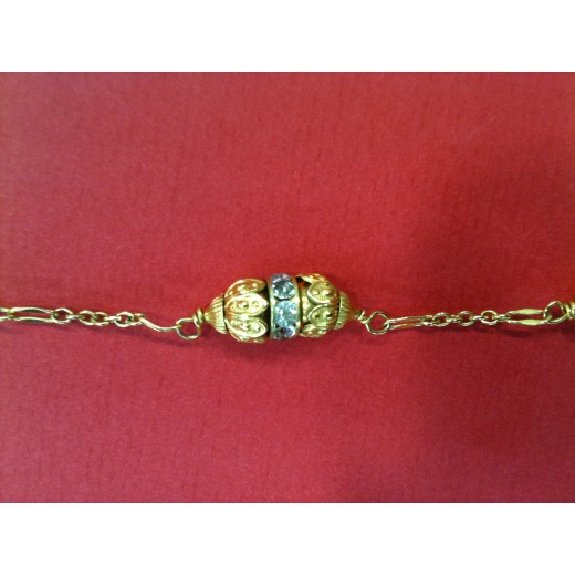 Sautoir Chanel métal doré et perles Vintage