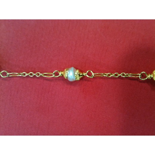 Sautoir Chanel métal doré et perles Vintage