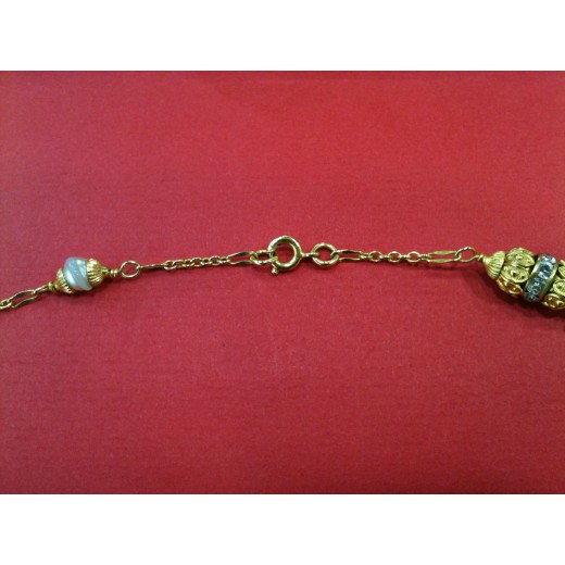 Sautoir Chanel métal doré et perles Vintage