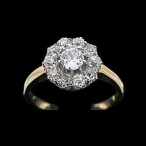 Bague ancienne marguerite deux ors diamants