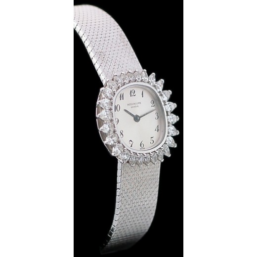 Montre Patek Philippe mécanique en or et diamants