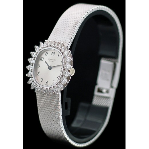 Montre Patek Philippe mécanique en or et diamants