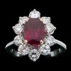 Bague marguerite moderne en or, diamants et rubis