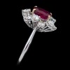 Bague marguerite moderne en or, diamants et rubis