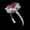 Bague marguerite moderne en or, diamants et rubis