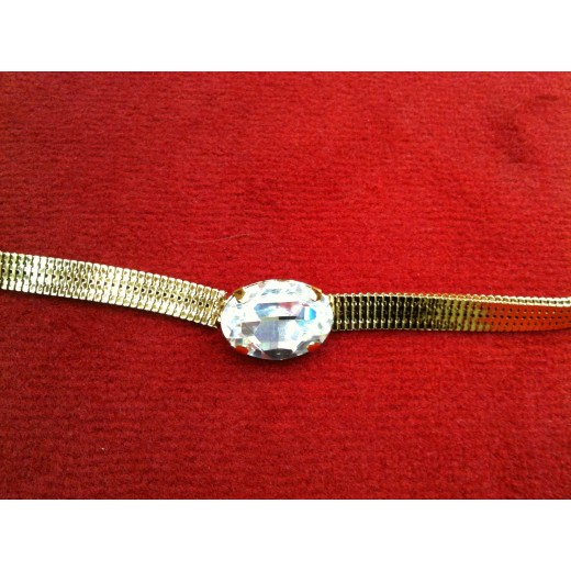 Ceinture Yves Saint Laurent en métal doré