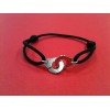 Bracelet Dinh Van Menottes en argent sur cordon noir