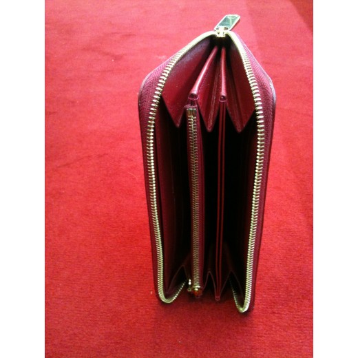 Portefeuille Louis Vuitton Zippy en cuir monogram vernis