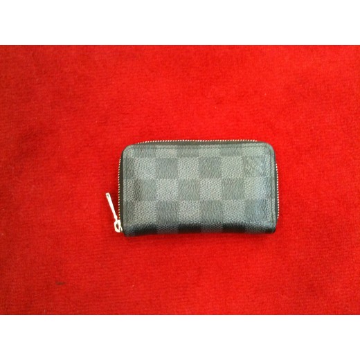 Porte-monnaie Louis Vuitton Zippy en toile damier