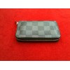 Porte-monnaie Louis Vuitton Zippy en toile damier