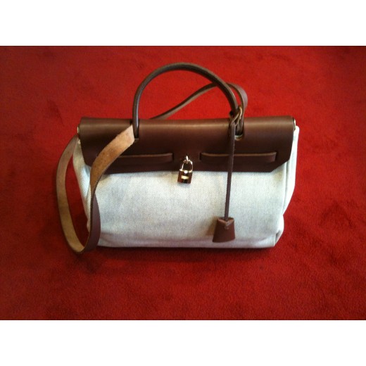 Sac Hermès Herbag en tissu beige et cuir marron