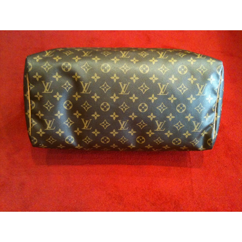 LOUIS VUITTON. Sac Speedy 40 en toile monogram et cuir n…