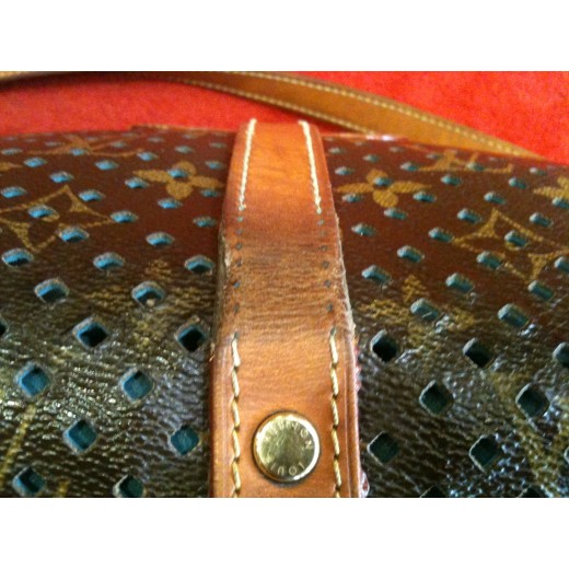 Sac Louis Vuitton Saumur Flore en toile monogram