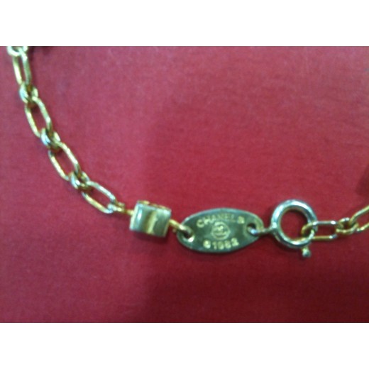 Bracelet Chanel en métal doré
