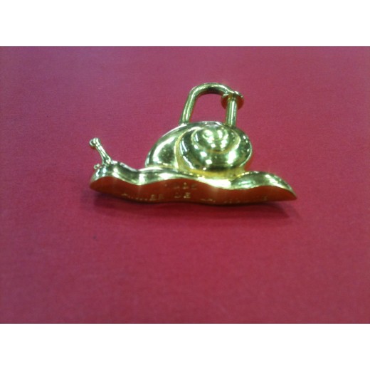 Porte-clés Hermès Escargot en plaqué or.