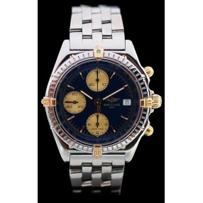 Montre Breitling Chronomat en or & acier