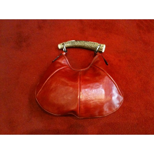 Sac Yves Saint Laurent Monbasa en cuir rouge et corne de cerf