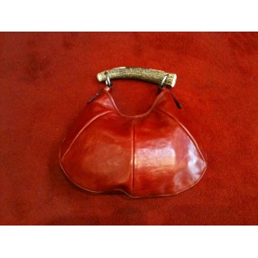 Sac Yves Saint Laurent Monbasa en cuir rouge et corne de cerf