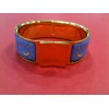 Bracelet Hermès en émail et plaqué or