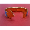 Bracelet Hermès en émail et plaqué or