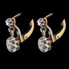 Boucles d'oreilles dormeuses deux ors et diamants