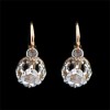 Boucles d'oreilles dormeuses deux ors et diamants