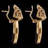 Boucles d'oreilles panthères en or et émeraudes