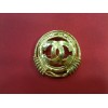 Broche Chanel en métal doré 