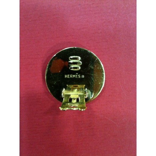 Boucles d'oreille Hermès en émail et plaqué or