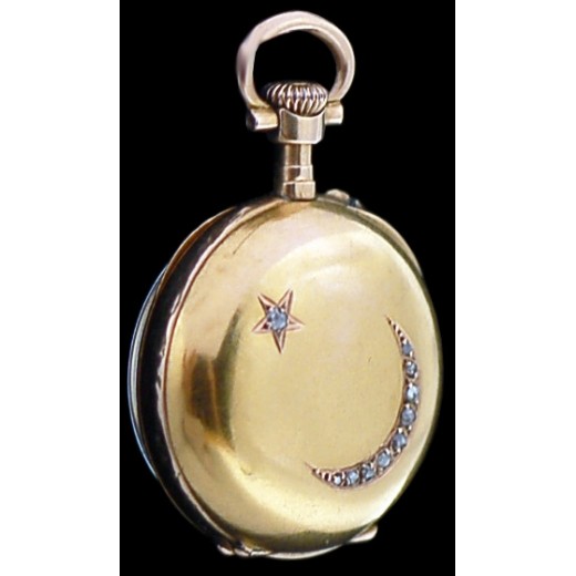 Montre de col ancienne en or et diamants