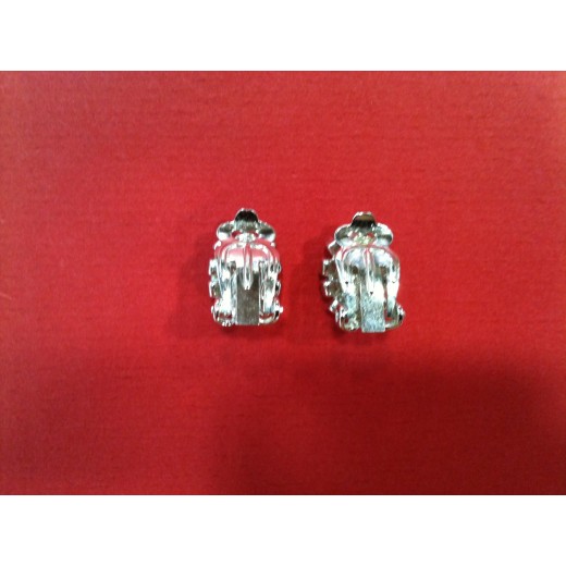 Boucles d'oreilles Christian Dior en métal argenté
