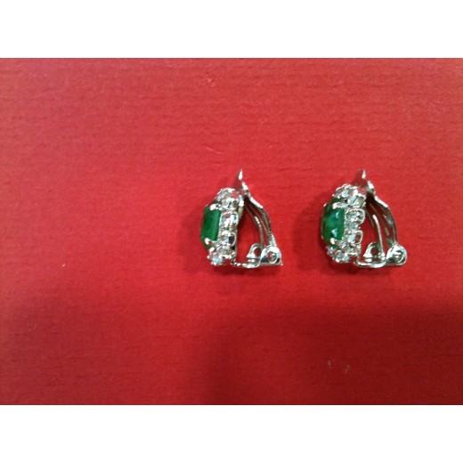 Boucles d'oreilles Christian Dior en métal argenté