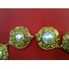 Collier Chanel en métal doré et perles