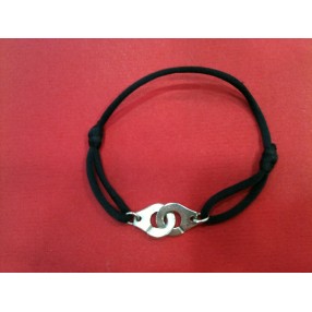 Bracelet Dinh Van Menottes R12 sur cordon noir
