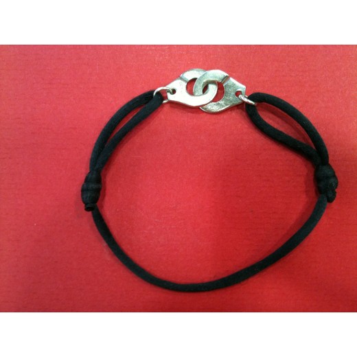 Bracelet Dinh Van Menottes R12 sur cordon noir