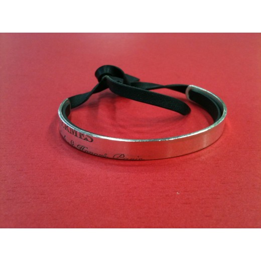 Bracelet Hermès Cartouche en cuir noir et argent