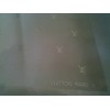 Foulard Louis Vuitton Monogram en soie.