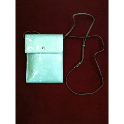 Pochette Louis Vuitton  en cuir vernis beige