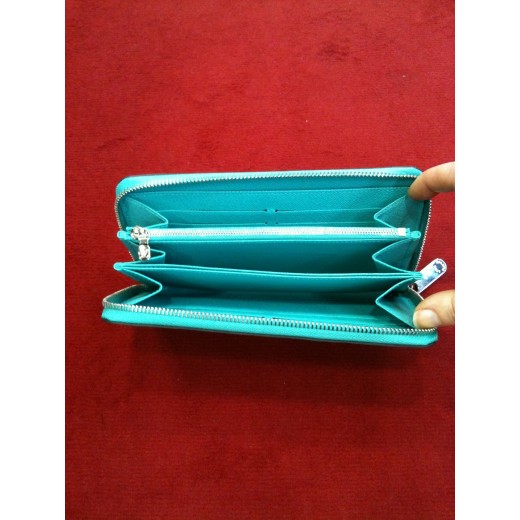 Compagnon Louis Vuitton Zippy en cuir épi turquoise