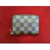 Porte-monnaie Louis Vuitton Zippy en toile damier