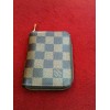 Porte-monnaie Louis Vuitton Zippy en toile damier