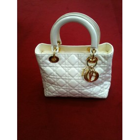 Sac Dior Lady Dior en cuir vernis ivoire 