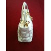 Sac Dior Lady Dior en cuir vernis ivoire 