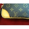 Pochette Louis Vuitton Marly dragonne en toile monogram