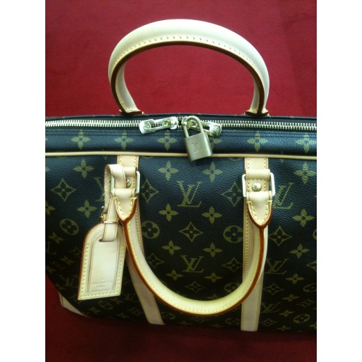 Porte-documents Louis Vuitton Voyage en toile monogram