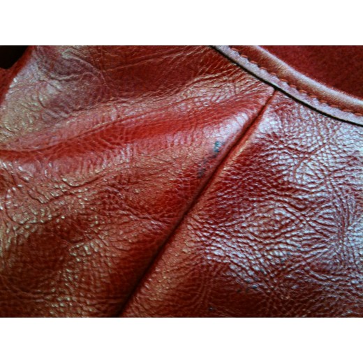 Sac Yves Saint Laurent Monbasa en cuir rouge et corne de cerf