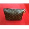 Trousse de toilette Louis Vuitton en toile monogram